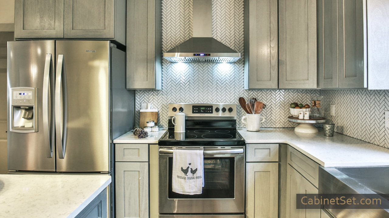 Newport Grey Shaker cabinets with oven.
